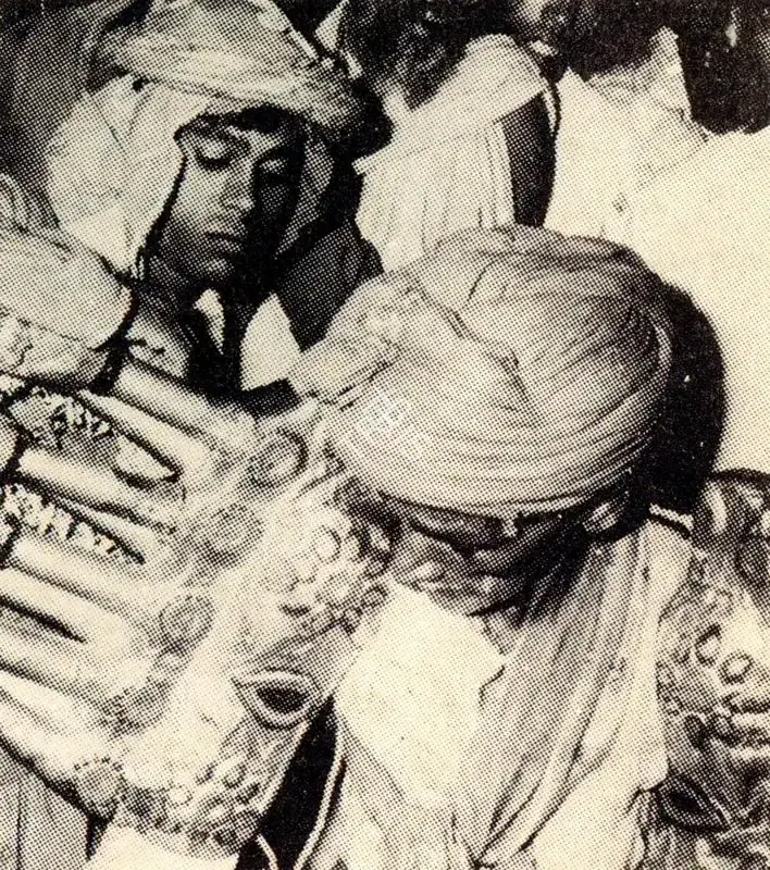 Unknown (Photographer). An Actor Helps Ravana with his Wooden Arms, n.d. | Contemporary Photograph