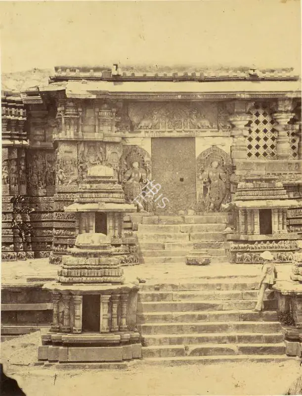 Pigou, William Henry (Photographer). Hullabeed. The Great Temple. South Entrance - Architecture in Dharwar and Mysore Published by John Murray. London 1866. Photographs by Dr. William Henry Pigou, Dr. Andrew C. Neill and Col. Thomas Biggs with an historical and descriptive memoir by Colonel Meadows Taylor and architectural notes by James Fergusson. Albumen print pasted on mount, c.1855 | Antiquarian Photograph | Photography | 00115966