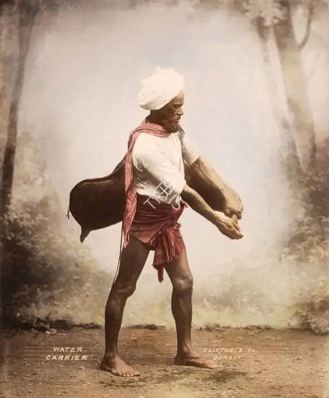 Studio Clifton & Co. (Photographic Studio). Water Carrier - From the album "L.G. to L.R.' by Clifton and Co.. Hand coloured calotype print pasted on mount, 1900 | Antiquarian Photograph | Photography | 00115222