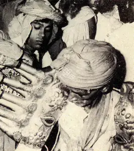 Unknown (Photographer). An Actor Helps Ravana with his Wooden Arms, n.d. | Contemporary Photograph