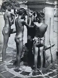 Bacha, Major R. A. (Photographer). Three Urchins Take an Open-Air Bath on Apollo Bunder and are Captured for Posperity, n.d. | Contemporary Photograph