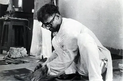 Unknown (Photographer). Subramanyan fixing terracotta relief, 1981 | Contemporary Photograph