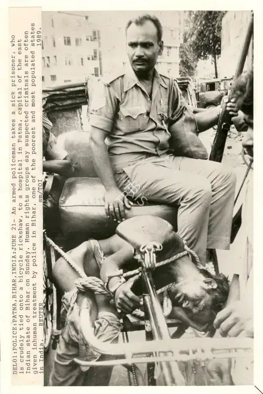 Sunil Malhotra (Photographer), Del01: Police: Patna, Bihar, India: June21, 1989, Contemporary Photograph