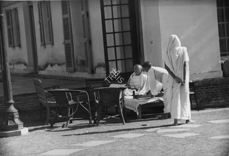Henri Cartier-Bresson (Photographer), Gandhiji with his staff at Birla House, 30 January 1948, 1948, Contemporary Photograph