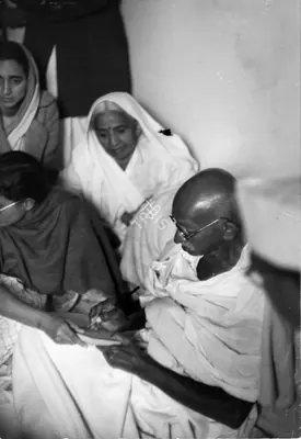 Henri Cartier-Bresson (Photographer), Gandhiji corrects a message just after breaking his fast, Birla House, 1948, Contemporary Photograph