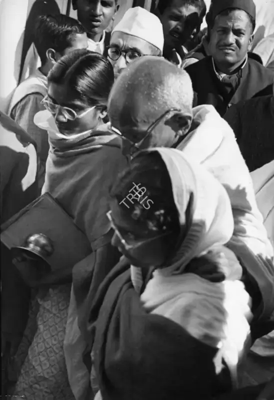 Henri Cartier-Bresson (Photographer), Passing through the crowds, Birla House 29 January 1948, 1948, Contemporary Photograph