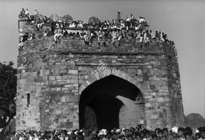 Henri Cartier-Bresson (Photographer), Onlookers watch from the top of a monument as the funeral cortege goes by, 31 January 1948, 1948, Contemporary Photograph
