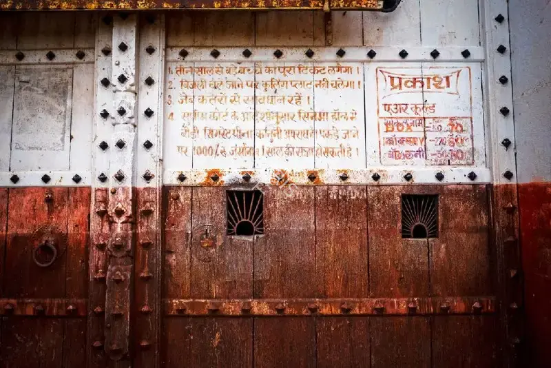 Hemant Chaturvedi (Photographer), Ticket window at Prakash Talkies, Sawai Madhopur, Rajasthan, 2024, Contemporary Photograph
