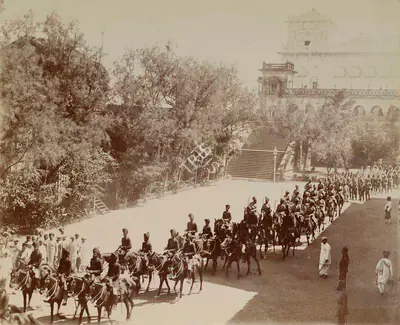 Studio Bourne & Shepherd (Photographic Studio), Procession leaving the Navalakha Palace to congratulate His Highness on his birthday. His Highness's Bodyguard and Risala Troops., 1909, Antiquarian Photograph