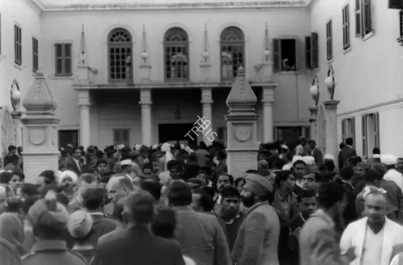 Henri Cartier-Bresson (Photographer), The day after the assassination, Gandhiji's body lies on a platform on the terrace of Birla House, huge crowds assemble below before the start of the funeral procession 31 January 1948 , 1948, Contemporary Photograph