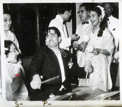 Unknown (Photographer). Raj Kapoor and his love for music. | Photographic Still | CinemaEducation | 00749411