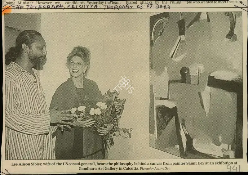 Aranya Sen (Photographer), Lee Alison Sibley, Wife of the US Consul-General, Hers the Philosophy Behind a Canvas from Painter Samit Dey at an Exhibition at Gandhara Art Gallery in Calcutta, 2003, Newspaper Clipping