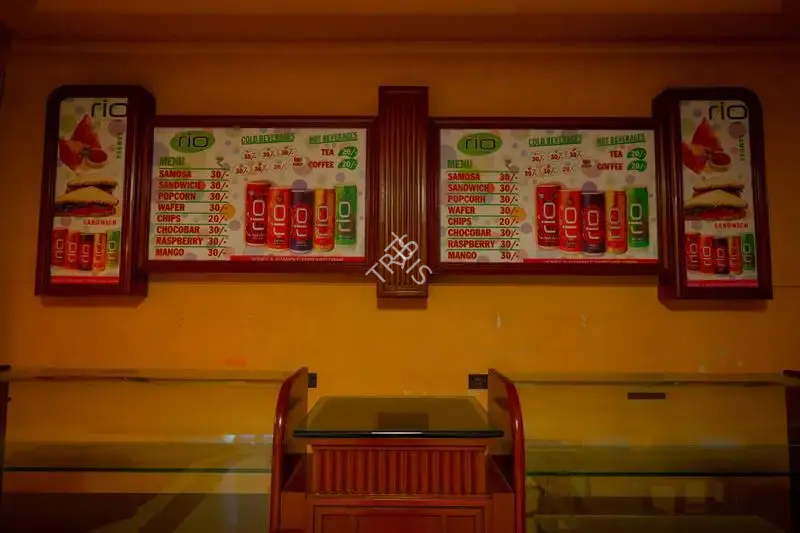 Hemant Chaturvedi (Photographer), Food counter of New Empire Theatre, Mumbai, India, 2024, Contemporary Photograph