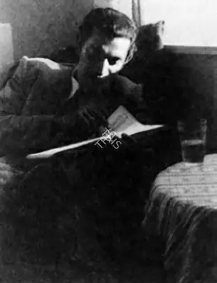 Unknown (Photographer). Ray at work on his kheror-khata. | Contemporary Photograph | CinemaEducation | 00724398