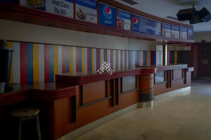 Hemant Chaturvedi (Photographer), Food counter of Regal Cinema, Mumbai, India, 2024, Contemporary Photograph