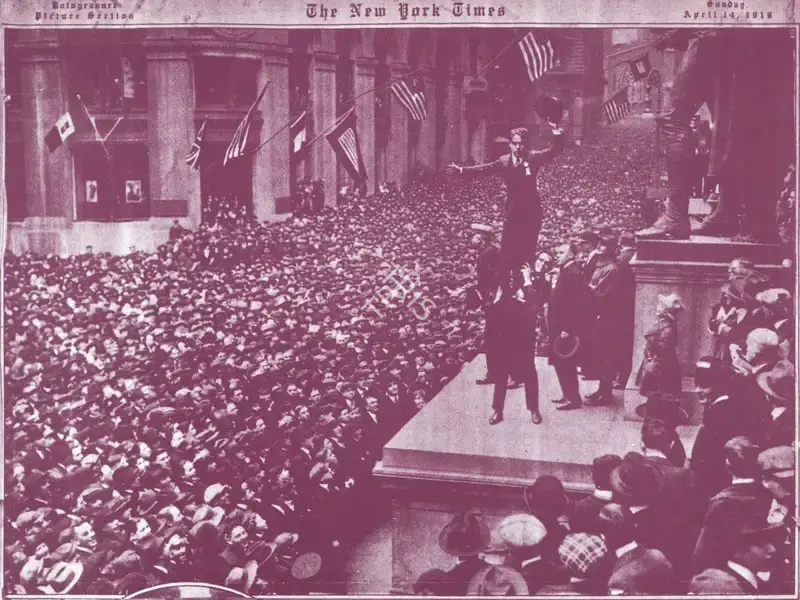 Unknown Photographer (Photographer), Image published in The New York Times on April 14, 1918: Charlie Chaplin hoisted on the shoulders of Douglas Fairbanks, at a rally in Wall Street promoting Liberty Bonds to raise funds for World War I, Newspaper Clipping 