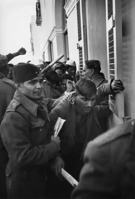 Henri Cartier-Bresson (Photographer), Police controlling the assembled crowds before the start of the funeral procession 31 January 1948, 1948, Contemporary Photograph
