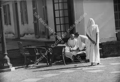 Henri Cartier-Bresson (Photographer), Gandhiji with his staff at Birla House, 30 January 1948, 1948, Contemporary Photograph