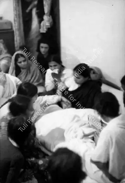 Henri Cartier-Bresson (Photographer), Prayers are chanted over Gandhiji's covered body 30 January 1948, 1948, Contemporary Photograph