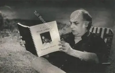 Unknown (Photographer). Mahesh Bhatt holding a copy of U.G.: What A Man!. | Photographic Still | Photography | 00840310