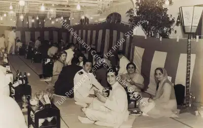 Unknown (Photographer). A Japanese dinner aboard the SS Asama Maru, America bound. A Purser with Bapsy, her friend Piroja and Jehangir. Photographic Still, 1939 | Contemporary Photograph, The Crucible of Painting, 2005 | Photography | 00801901