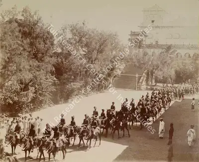 Studio Bourne & Shepherd (Photographic Studio), Procession leaving the Navalakha Palace to congratulate His Highness on his birthday. His Highness's Bodyguard and Risala Troops., 1909, Antiquarian Photograph