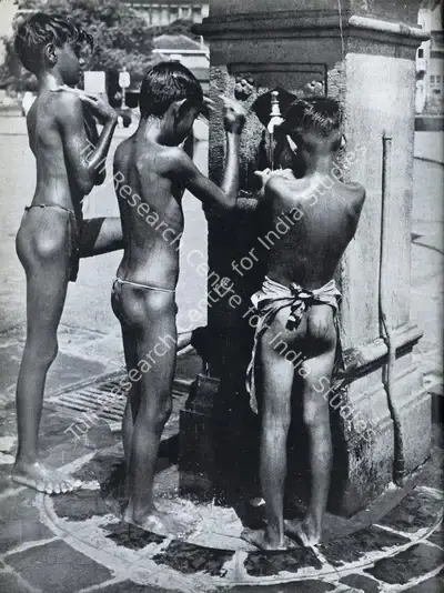 Major R. A. Bacha (Photographer), Three Urchins Take an Open-Air Bath on Apollo Bunder and are Captured for Posperity, Contemporary Photograph