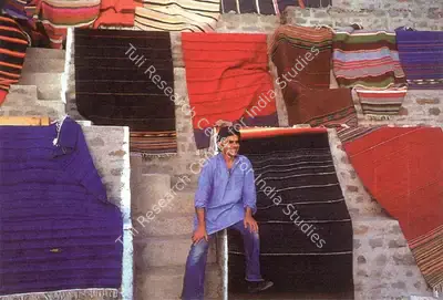 Unknown (Photographer), Vivan Sundaram Amidst Durries Woven at Pit-Loom in Ivy Lodge, Kasauli, 1980, Contemporary Photograph