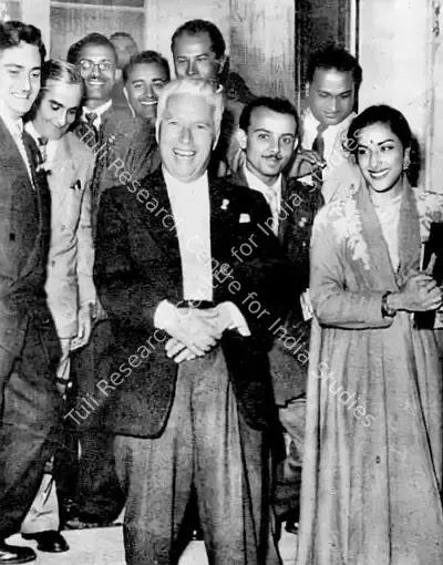 Unknown (Photographer). Charlie Chaplin with the Indian film delegation at Venice International Film Festival, 1953 | Photographic Still | CinemaEducation | 00440370