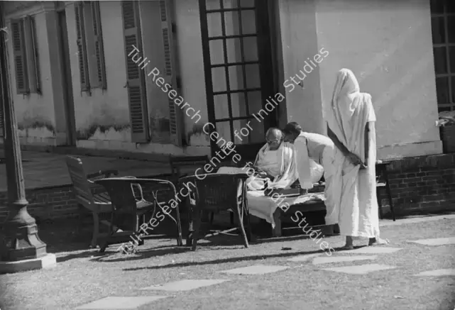 Cartier-Bresson, Henri (Photographer). Gandhiji with his staff at Birla House, 30 January 1948. Silver Gelatin Print, 1948 | Contemporary Photograph | Photography | 00112992