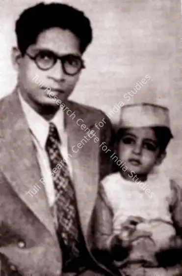 Unknown (Photographer). With father on his second birthday. 11 October 1944 | Contemporary Photograph, The Bachchans, 2024 | CinemaEducation | 00506280