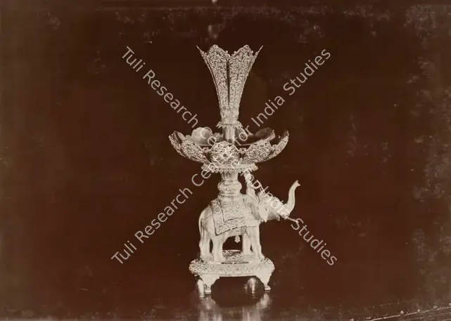 Studio Bourne & Shepherd (Photographic Studio). Centre Piece presented by Sheth Nurmamad Amad - From the album 'Shri Bhagvatsinhji Silver Jubilee Memorial Album. Gondal A.D. 1909 by Bourne & Shepherd'. Silver gelatin print pasted on mount, 1909 | Antiquarian Photograph | Photography | 00115357