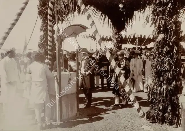 Studio Bourne & Shepherd (Photographic Studio). His Excellency Sir George Sydenham Clarke. G.C.I.E., Governer of Bombay, laying the foundation stone of the Silver Jubliee Memorial institude at Gondal - From the album 'Shri Bhagvatsinhji Silver Jubilee Memorial Album. Gondal A.D. 1909 by Bourne & Shepherd'. Silver gelatin print pasted on mount, 1909 | Antiquarian Photograph | Photography | 00115362