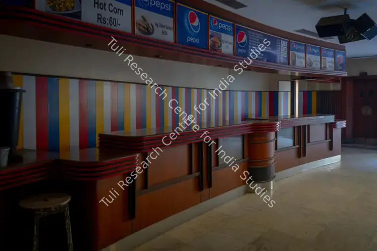 Chaturvedi, Hemant (Photographer). Food counter of Regal Cinema, Mumbai, India. c. 2019-2024 | Contemporary Photograph | Photography | 00840061