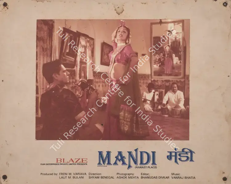 Mehta, Ashok (Cinematographer), Mandi, 1983 | Photographic Still Mounted on Lobby Card | CinemaEducation | 00765840
