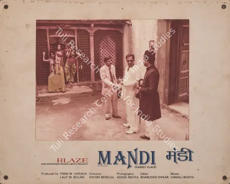 Mehta, Ashok (Cinematographer), Mandi, 1983 | Photographic Still Mounted on Lobby Card | CinemaEducation | 00765843